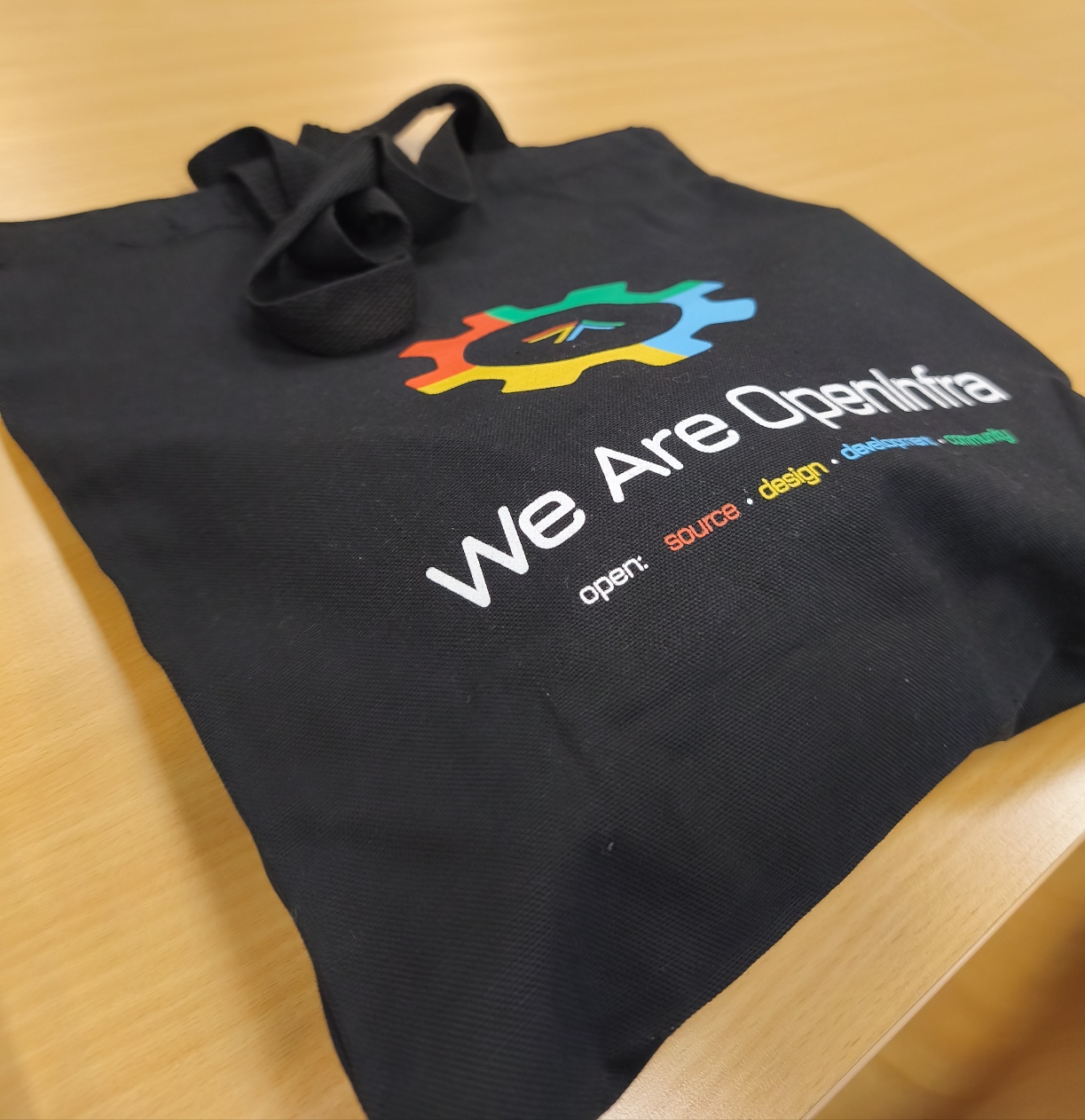 a black bag with the sentence : "we are openinfra"